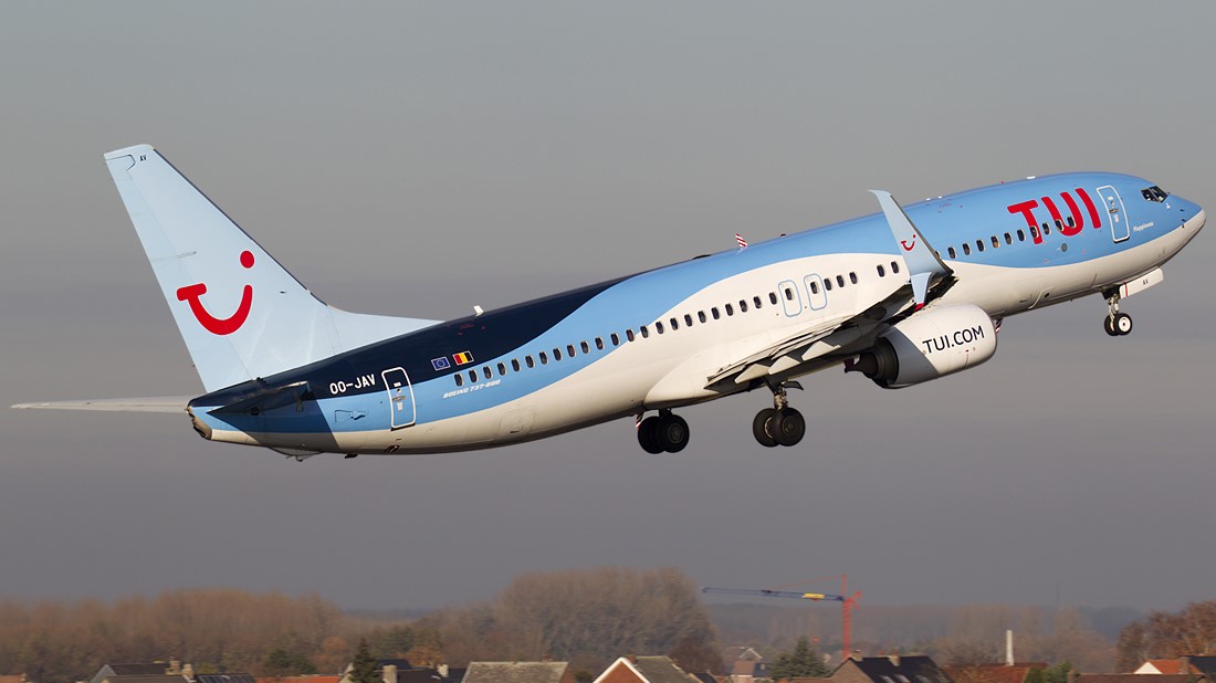 TUI Airlines aircraft in flight, taking off