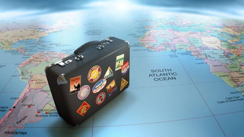 suitcxase on a world map