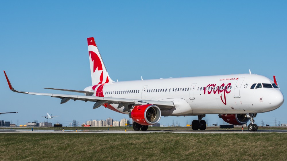 Air Canada Rouge aircraft on tarmac