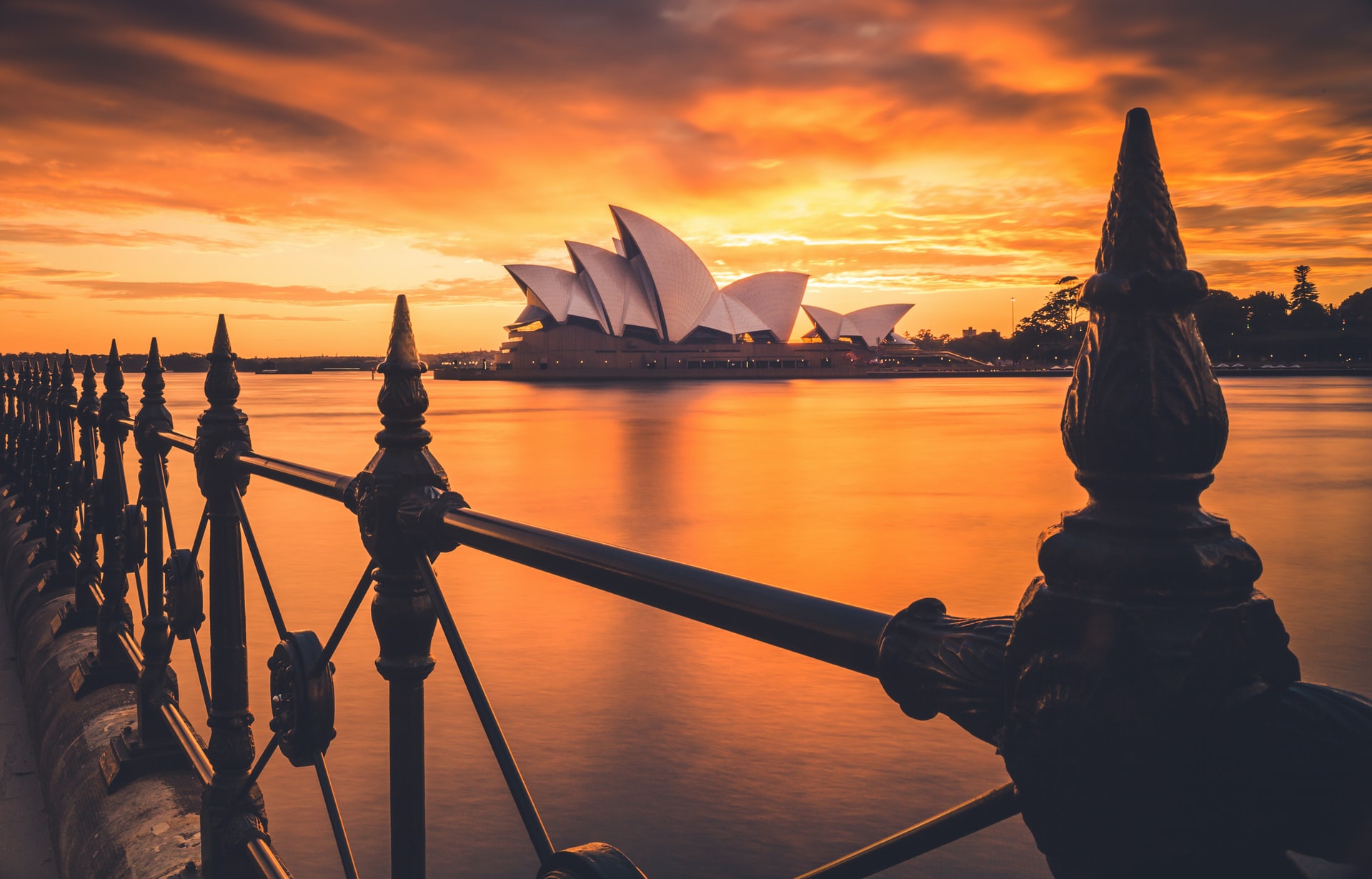 The Opera House at sunset viewed from a bridge