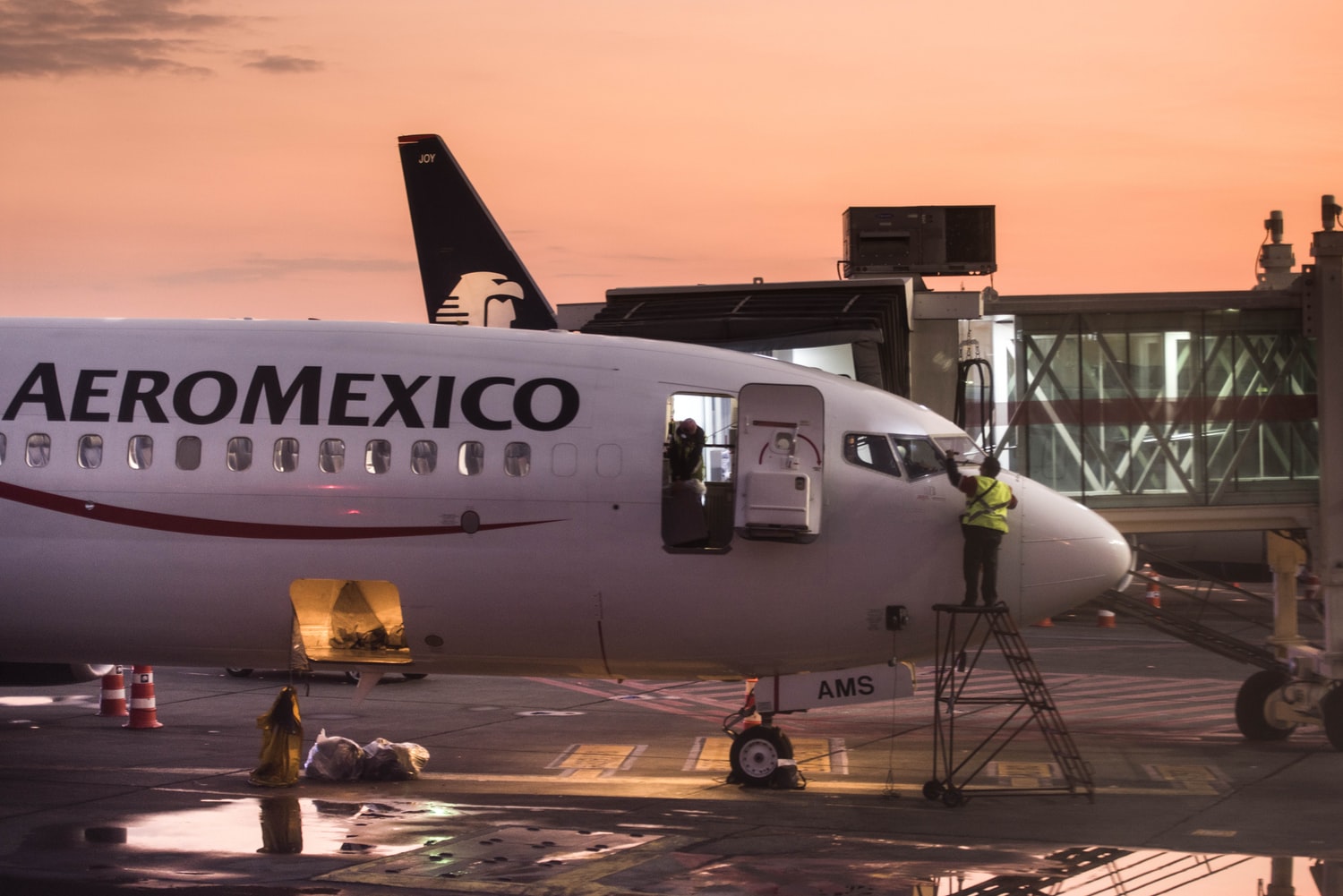 Mexico City airport at dusk, Aeromexico aircraft on the foreground