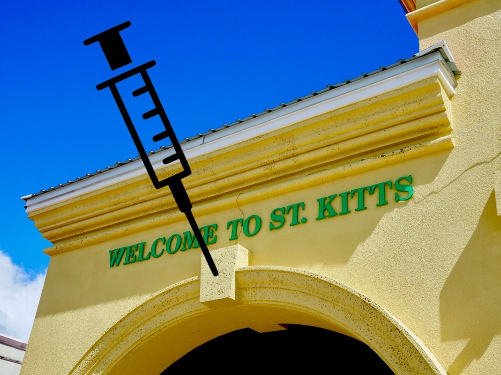 Welcome to St. Kitts on a building and an syringe illustration