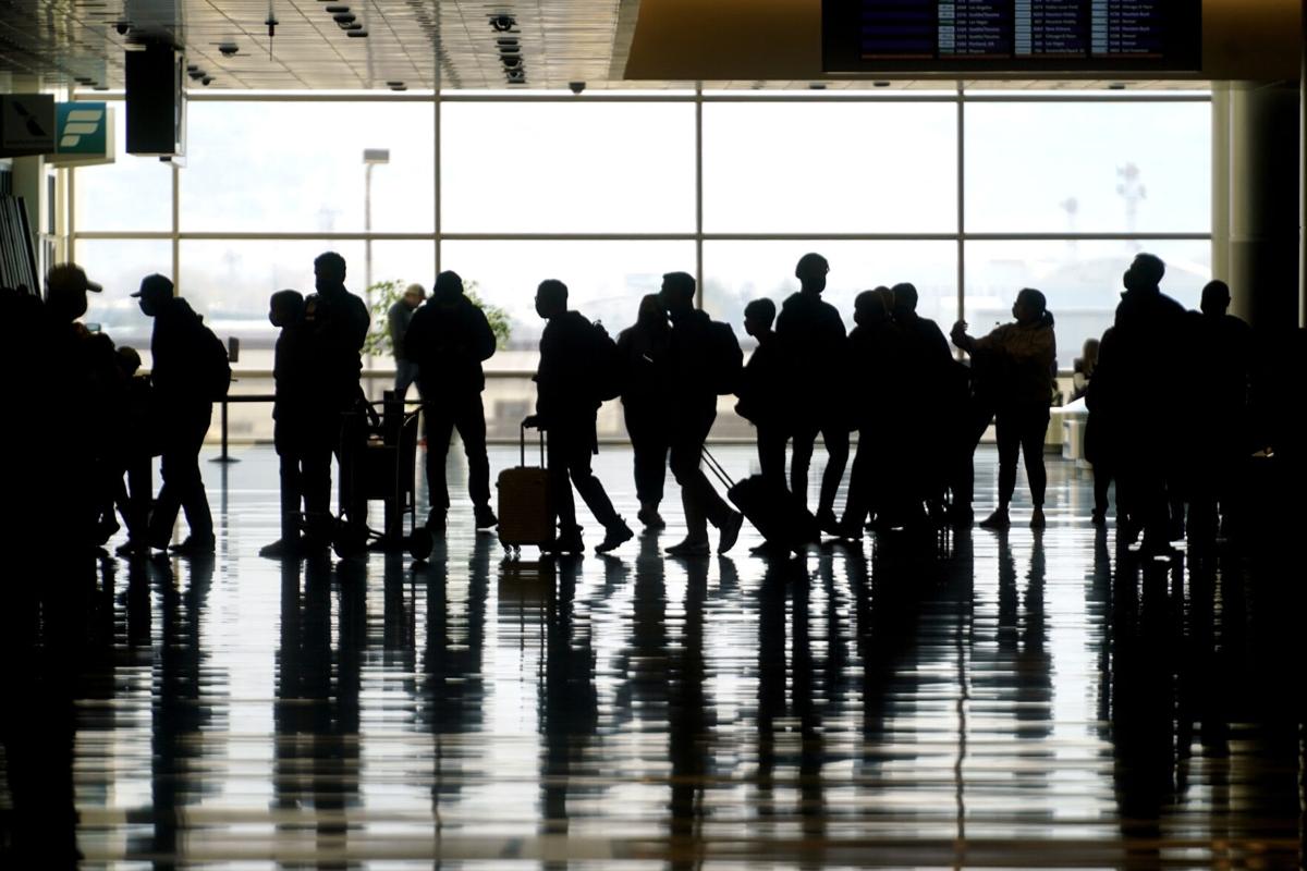 people crowding an airport