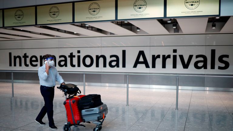 a traveler arriving at a airport