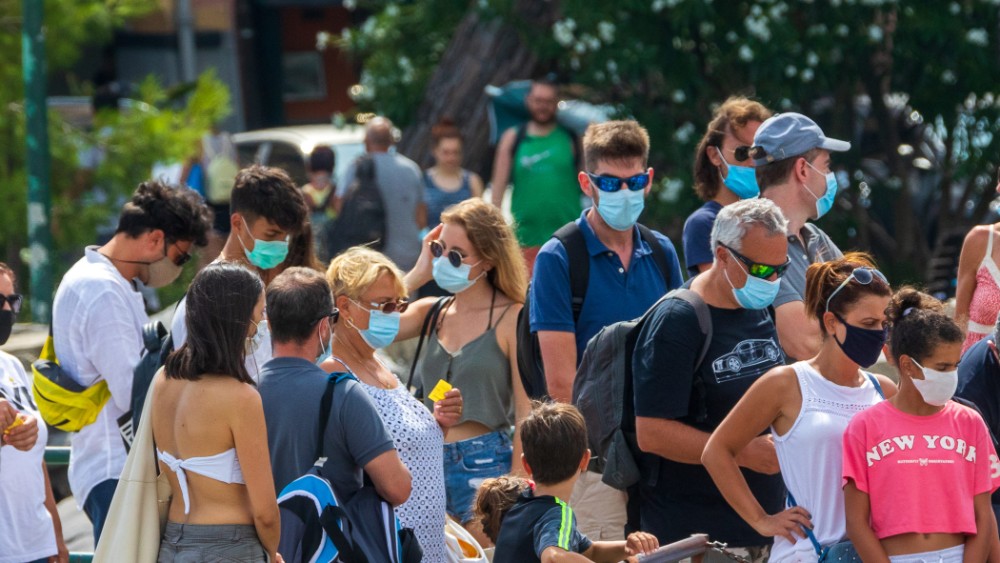 tourists wearing masks