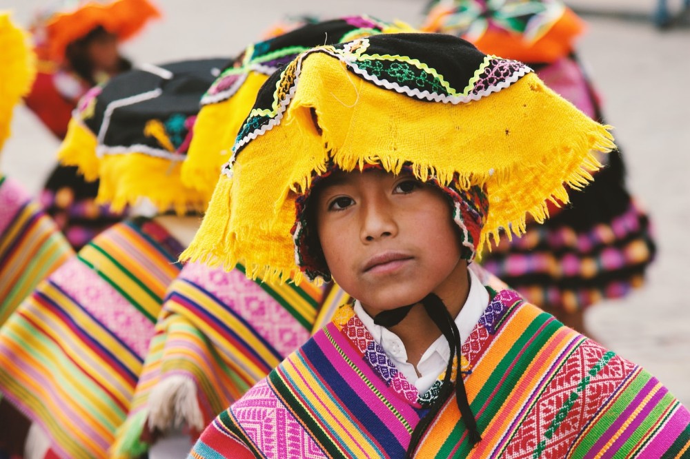 indigenous child with typical clothes