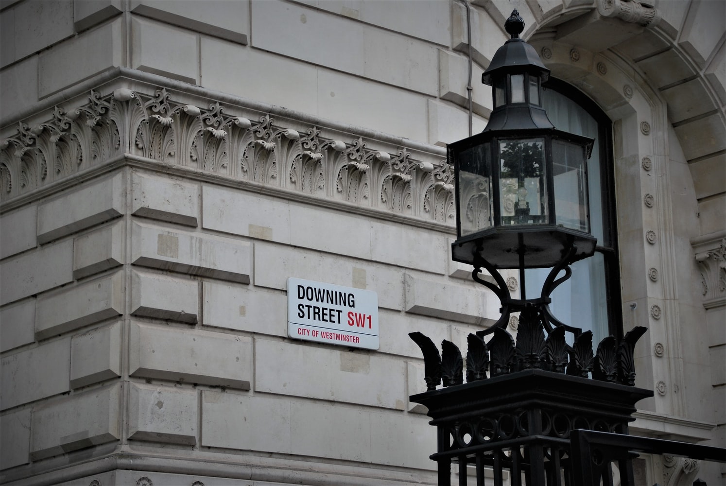 Downing Street sign on a building, WTTC, UK