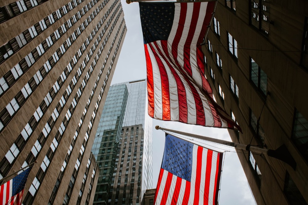 buildings and US flags in New York