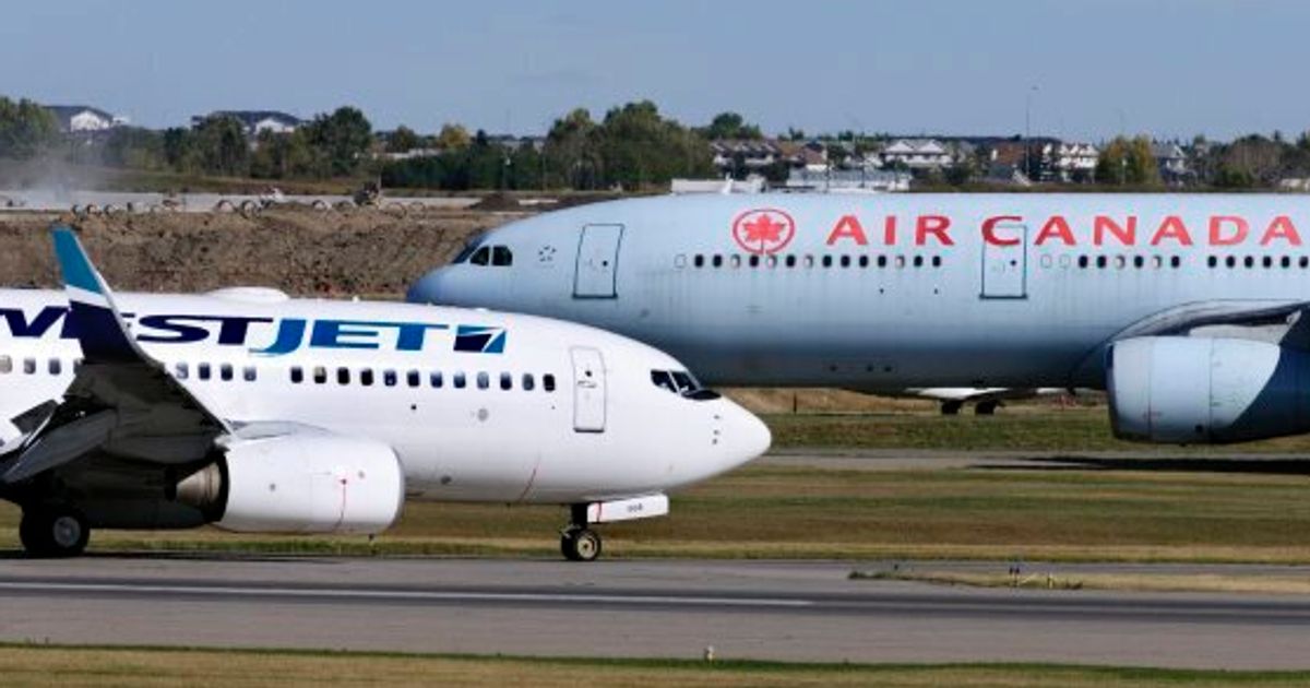 Air Canada and WestJet aircrafts on tarmac