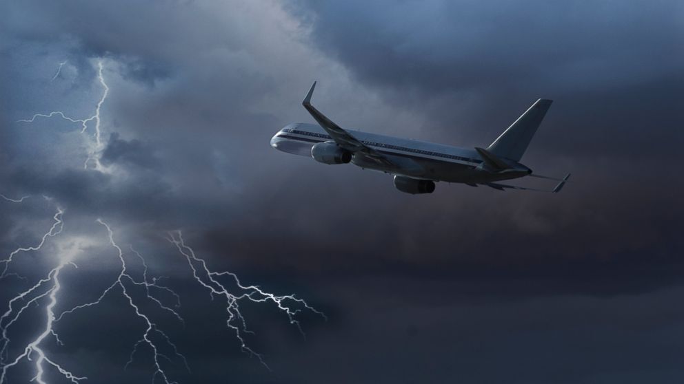 plane flying in the storm