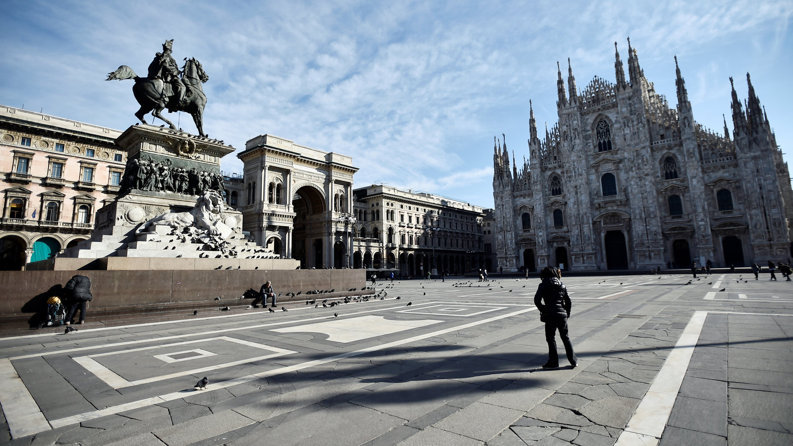 Empty square in Italy, one person