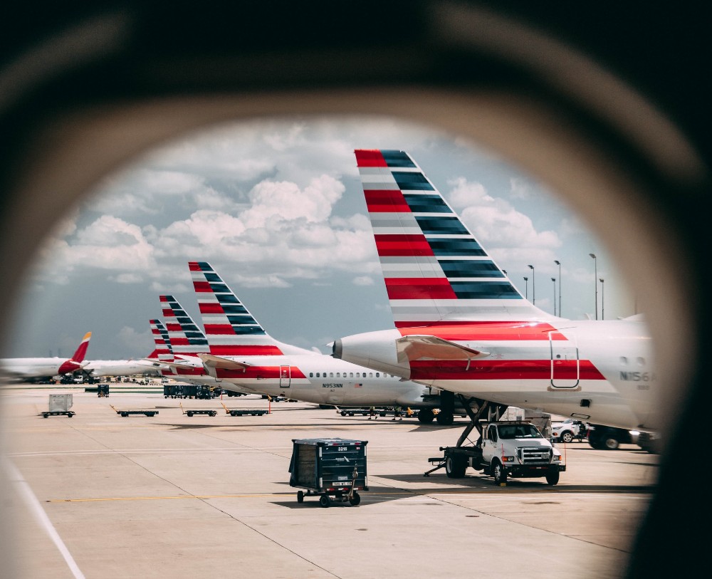 American Airlines tails viewed from a plane window