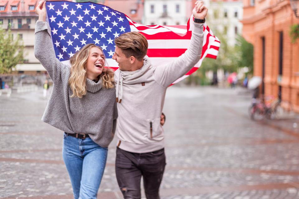 American couple with American flag