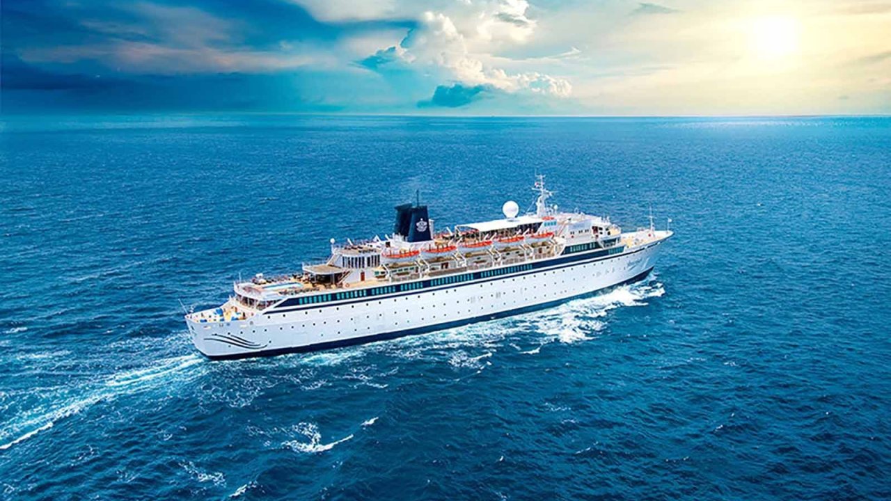 cruise ship at sea viewed from above