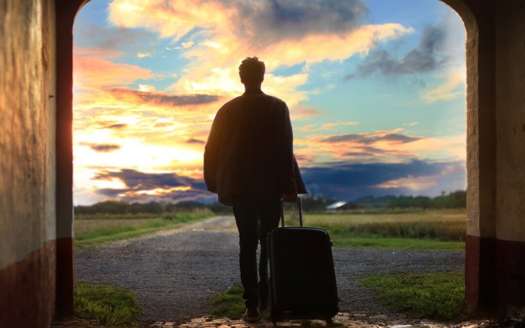 man with a wheel suitcase