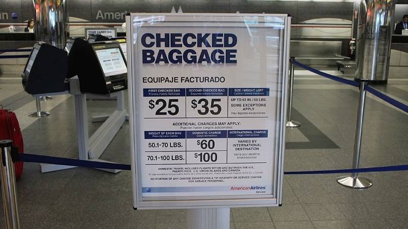 American Airlines Raises Fares for Checked Bags