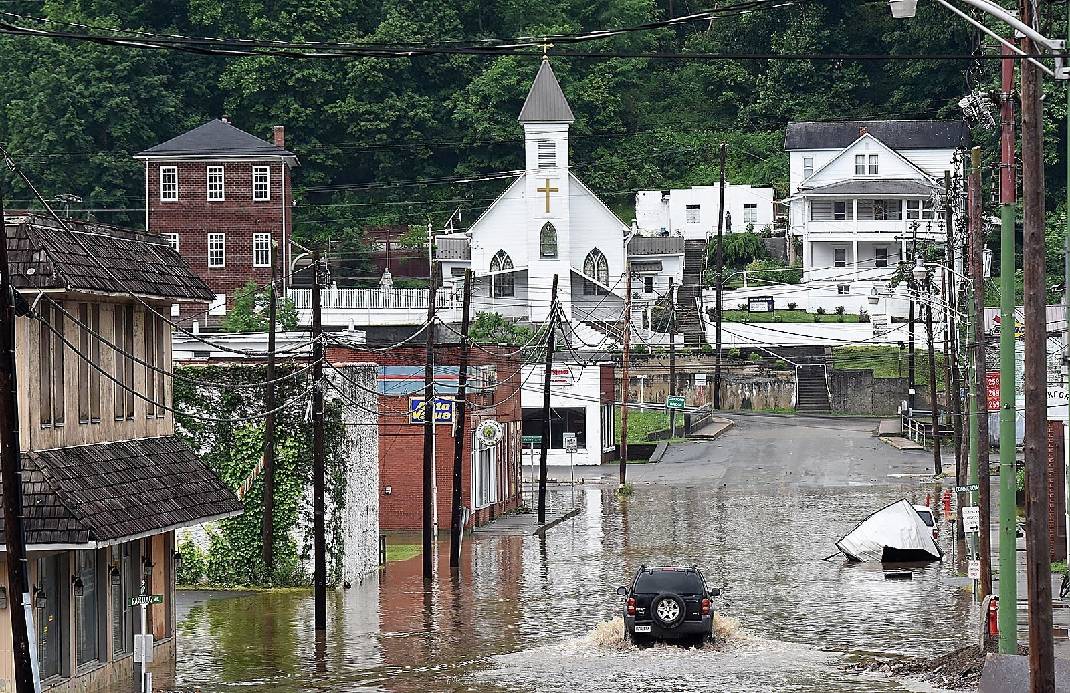 Two Dozen Dead, Tourists Stuck in West Virginia Floods